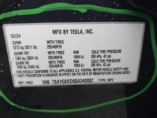 2025 Tesla Model Y Long Range with VIN 7SAYGDED8SA340082, listed as a IAAI auction lot 41915369 with 7,296 mi miles and . Bid and sale history available at carsss.com. Image 9.