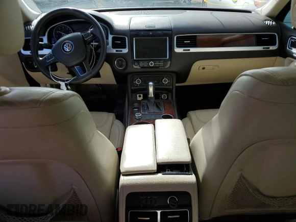 2012 Volkswagen Touareg Exec with VIN WVGEF9BP8CD008665, listed as a Copart auction lot 84611354 with 103,090 mi miles and Salvage Title. Bid and sale history available at DreamBid. Image 8.