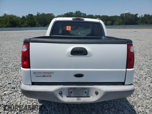 2002 Ford Explorer Sport Trac Value with VIN 1FMZU67E12UB93878, listed as a Copart auction lot 56306785 with 159,476 mi miles and Salvage title. Bid and sale history available at DreamBid. Image 6.