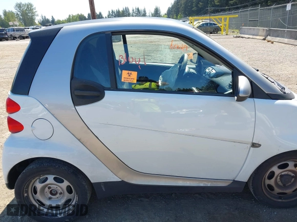 2012 Smart fortwo Pure z VIN WMEEJ3BAXCK563660, wystawiony jako IAAI lot #42165195 z przebiegiem 53 809 mil mil oraz . Historia ofert i sprzedaży dostępna na DreamBid. Obrazek 14.