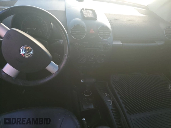 2009 Volkswagen Beetle S with VIN 3VWRF31Y59M410019, listed as a Copart auction lot 77861384 with Not provided miles and Salvage title. Bid and sale history available at DreamBid. Image 8.