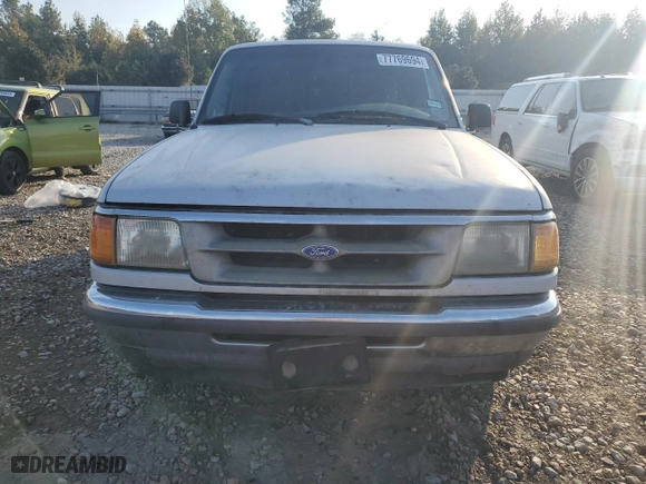 1997 Ford Ranger XL with VIN 1FTCR14A7VPA56690, listed as a Copart auction lot 77769694 with 299,529 mi miles and Salvage Title. Bid and sale history available at carsss.com. Image 5.