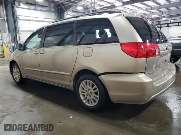 2010 Toyota Sienna XLE with VIN 5TDYK4CC9AS297214, listed as a Copart auction lot 58168805 with 166,970 mi miles and Salvage title. Bid and sale history available at DreamBid. Image 2.