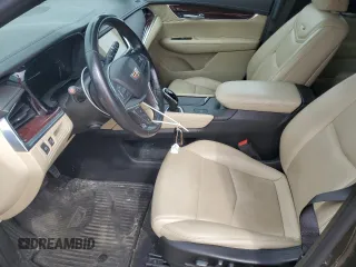 2019 Cadillac XT5 Luxury FWD with VIN 1GYKNCRSXKZ132871, listed as a Copart auction lot 54879405 with 57,325 mi miles and Salvage title. Bid and sale history available at DreamBid. Image 7.