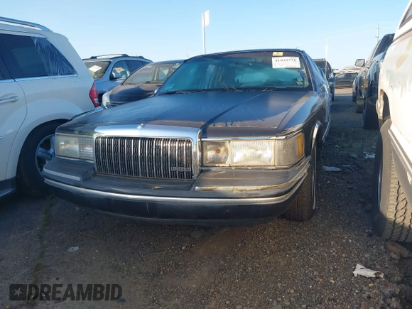 1994 Lincoln Town Car Signature z VIN 1LNLM82W9RY699141, wystawiony jako IAAI lot #41933771 z przebiegiem Nie podano mil oraz . Historia ofert i sprzedaży dostępna na DreamBid. Obrazek 2.