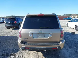 2007 Honda Pilot EX-L with VIN 5FNYF28537B024558, listed as a IAAI auction lot 41806196 with 196,256 mi miles. Bid and sale history available at carsss.com. Image 16.