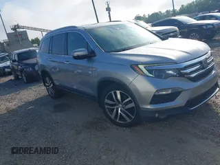 2016 Honda Pilot Elite with VIN 5FNYF6H06GB048879, listed as a IAAI auction lot 42619174 with 187,882 mi miles and . Bid and sale history available at DreamBid. Image 1.