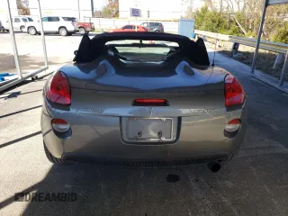 2006 Pontiac Solstice z VIN 1G2MB33BX6Y109591, wystawiony jako Copart lot #80684234 z przebiegiem 90 032 mil mil oraz Czysty tytuł • Clean title. Historia ofert i sprzedaży dostępna na DreamBid. Obrazek 6.