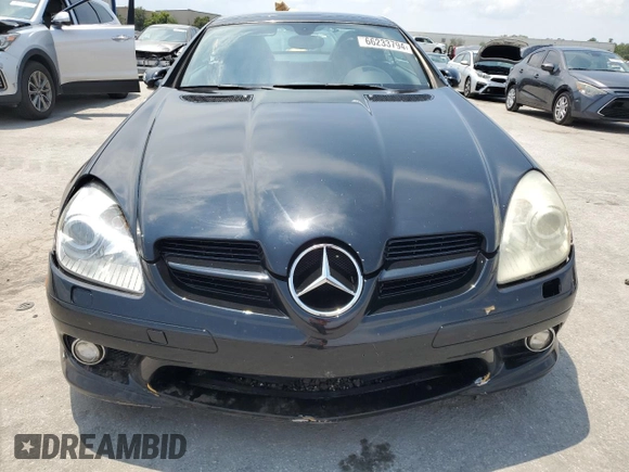 2007 Mercedes-Benz SLK-Class 3.0L with VIN WDBWK54F57F157433, listed as a Copart auction lot 66233794 with 104,198 mi miles and Salvage Title. Bid and sale history available at carsss.com. Image 5.
