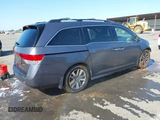 2015 Honda Odyssey Touring Elite с VIN 5FNRL5H93FB056183, выставлен на аукционе IAAI как лот 42073205 с пробегом 119 874 миль миль и . История ставок и продаж доступна на DreamBid. Изображение 4.