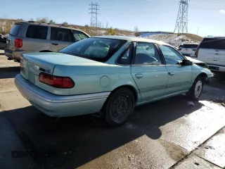 1995 Ford Taurus GL z VIN 1FALP5242SG181625, wystawiony jako Copart lot #81184774 z przebiegiem 107 385 mil mil oraz Szkoda całkowita • Salvage title. Historia ofert i sprzedaży dostępna na DreamBid. Obrazek 3.