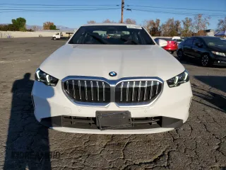 2024 BMW 5 Series 530i with VIN WBA43FJ0XRCS05943, listed as a Copart auction lot 87277084 with 4,924 mi miles and Salvage Title. Bid and sale history available at carsss.com. Image 5.