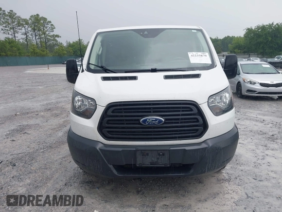 2018 Ford Transit z VIN 1FTYR2YMXJKB11642, wystawiony jako IAAI lot #42235879 z przebiegiem 149 561 mil mil oraz . Historia ofert i sprzedaży dostępna na DreamBid. Obrazek 12.