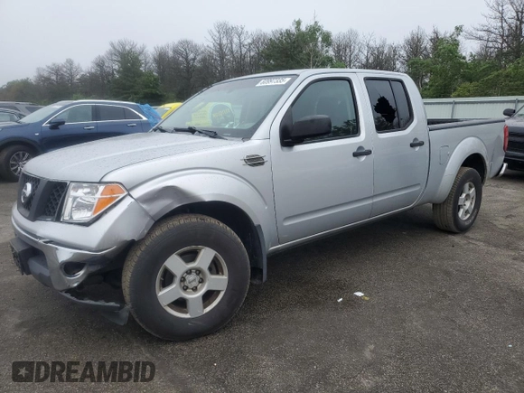 2007 Nissan Frontier SE with VIN 1N6AD09W97C423634, listed as a Copart auction lot 60997335 with 161,871 mi miles and Salvage title. Bid and sale history available at DreamBid. Image 1.