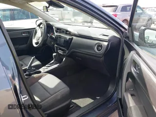 2018 Toyota Corolla L with VIN 5YFBURHEXJP806632, listed as a IAAI auction lot 41933984 with 70,091 mi miles and . Bid and sale history available at DreamBid. Image 5.
