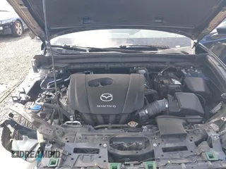 2021 Mazda CX-30 Select with VIN 3MVDMBBL6MM243726, listed as a IAAI auction lot 42353943 with 67,239 mi miles and . Bid and sale history available at DreamBid. Image 10.