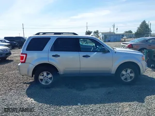 2010 Ford Escape XLT with VIN 1FMCU9D70AKD46774, listed as a IAAI auction lot 41857882 with 93,409 mi miles. Bid and sale history available at carsss.com. Image 13.