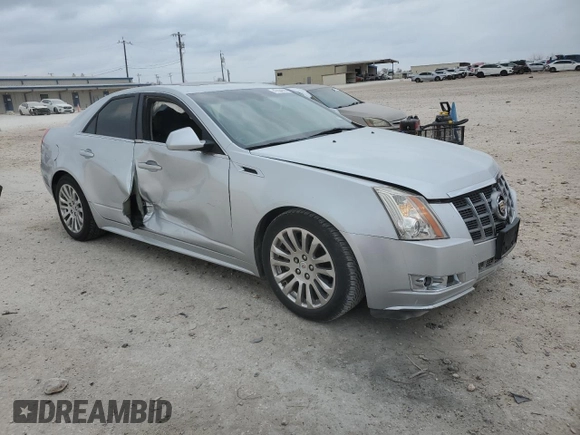 2012 Cadillac CTS Premium with VIN 1G6DP5E31C0120507, listed as a Copart auction lot 47694635 with 104,422 mi miles and Salvage title. Bid and sale history available at DreamBid. Image 4.