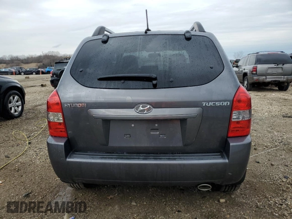 2009 Hyundai Tucson GLS with VIN KM8JM12B79U042597, listed as a Copart auction lot 52164465 with 90,943 mi miles and Salvage Title. Bid and sale history available at carsss.com. Image 6.