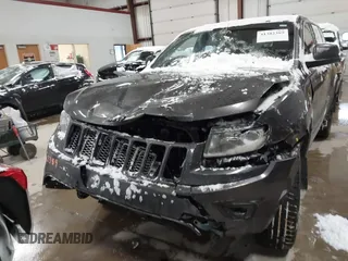 2015 Jeep Grand Cherokee Laredo with VIN 1C4RJFAGXFC752489, listed as a IAAI auction lot 41382389 with 147,892 mi miles. Bid and sale history available at carsss.com. Image 13.