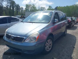2011 Kia Sedona LX with VIN KNDMG4C7XB6394183, listed as a IAAI auction lot 41988292 with 246,557 mi miles. Bid and sale history available at carsss.com. Image 2.