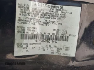 2007 Ford Focus S with VIN 1FAFP34N47W313952, listed as a IAAI auction lot 42799614 with 247,541 mi miles and . Bid and sale history available at DreamBid. Image 9.