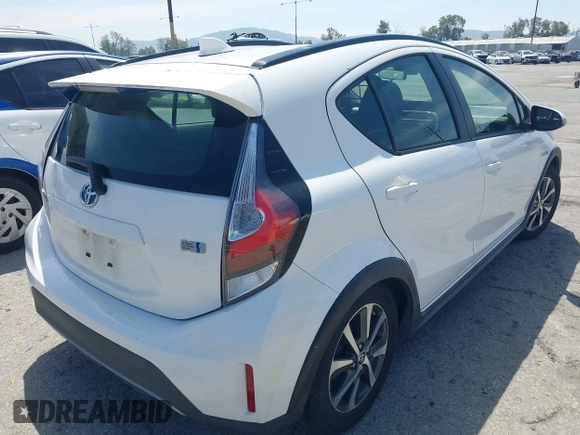 2018 Toyota Prius One with VIN JTDKDTB33J1613019, listed as a IAAI auction lot 42063768 with 59,143 mi miles and . Bid and sale history available at DreamBid. Image 4.