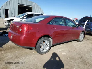 2005 Pontiac G6 with VIN 1G2ZG528054173847, listed as a Copart auction lot 77558494 with 84,527 mi miles and Salvage Title. Bid and sale history available at carsss.com. Image 3.