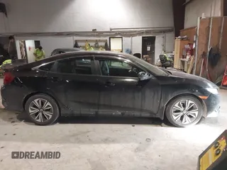 2016 Honda Civic Sedan EX-L with VIN 19XFC1F75GE210803, listed as a IAAI auction lot 41424370 with 111,848 mi miles. Bid and sale history available at carsss.com. Image 13.
