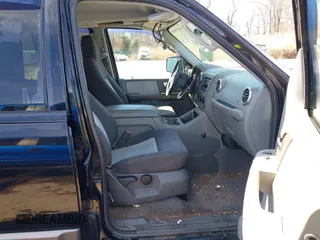 2004 Ford Expedition Special Service with VIN 1FMPU16L44LA17586, listed as a IAAI auction lot 41619534 with 140,299 mi miles. Bid and sale history available at carsss.com. Image 5.