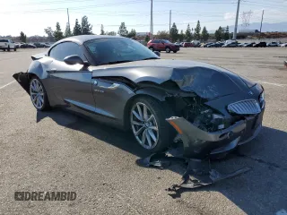 2014 BMW Z4 sDrive35i with VIN WBALM7C50EE385780, listed as a Copart auction lot 74046914 with 88,766 mi miles and Salvage Title. Bid and sale history available at carsss.com. Image 4.