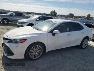 2018 Toyota Camry LE с VIN JTNB11HK2J3001972, выставлен на аукционе Copart как лот 58079565 с пробегом 90 841 миль миль и Списание • Salvage title. История ставок и продаж доступна на DreamBid. Изображение 1.