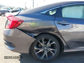 2021 Honda Civic Sedan Sport with VIN 19XFC2F88ME201751, listed as a IAAI auction lot 41643759 with 111,796 mi miles. Bid and sale history available at carsss.com. Image 6.