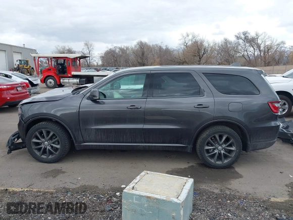 2017 Dodge Durango GT with VIN 1C4RDJDGXHC878859, listed as a IAAI auction lot 41724901 with 141,126 mi miles and . Bid and sale history available at carsss.com. Image 14.