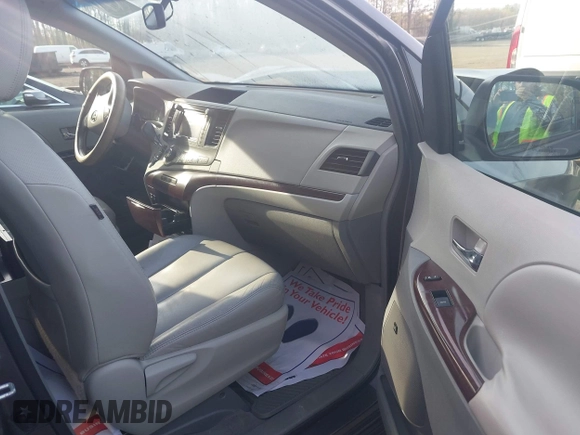 2011 Toyota Sienna XLE AAS with VIN 5TDYK3DC2BS093980, listed as a IAAI auction lot 42064568 with 196,893 mi miles. Bid and sale history available at carsss.com. Image 5.