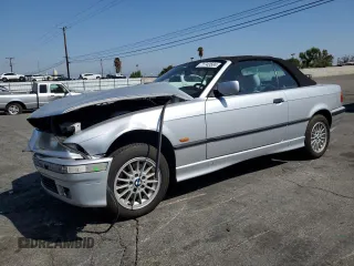 1999 BMW 3 Series 323ic with VIN WBABJ7333XEA17621, listed as a Copart auction lot 71743504 with 108,354 mi miles and Salvage Title. Bid and sale history available at carsss.com. Image 1.
