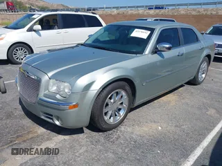 2006 Chrysler 300 C with VIN 2C3LA63H26H130160, listed as a IAAI auction lot 42170192 with 124,206 mi miles. Bid and sale history available at carsss.com. Image 2.