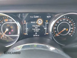 2022 Jeep Wrangler Unlimited Sahara z VIN 1C4HJXEN3NW242458, wystawiony jako IAAI lot #42352073 z przebiegiem 26 154 mil mil oraz . Historia ofert i sprzedaży dostępna na DreamBid. Obrazek 7.
