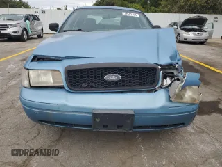 2004 Ford Police Interceptor Base w/3.27 Axle with VIN 2FAFP71W44X176595, listed as a Copart auction lot 72642164 with 136,019 mi miles and Salvage title. Bid and sale history available at DreamBid. Image 5.