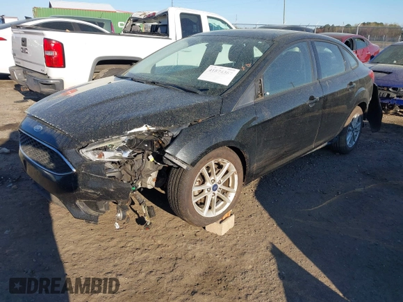 2015 Ford Focus SE with VIN 1FADP3F29FL210973, listed as a IAAI auction lot 41874367 with 128,705 mi miles. Bid and sale history available at carsss.com. Image 17.