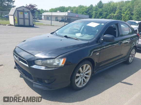 2010 Mitsubishi Lancer GTS z VIN JA32X8HWXAU002021, wystawiony jako IAAI lot #42523978 z przebiegiem 165 635 mil mil oraz . Historia ofert i sprzedaży dostępna na DreamBid. Obrazek 2.