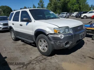 2005 Ford Escape XLT with VIN 1FMYU93135KA59180, listed as a Copart auction lot 69783974 with 126,255 mi miles and Salvage Title. Bid and sale history available at carsss.com. Image 4.