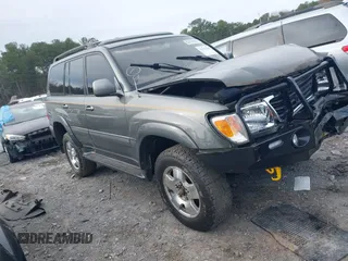 2001 Toyota Land Cruiser with VIN JTEHT05J012004269, listed as a IAAI auction lot 41037545 with 180,814 mi miles. Bid and sale history available at carsss.com. Image 1.
