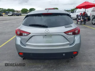 2014 Mazda 3 i Grand Touring with VIN JM1BM1M73E1216596, listed as a IAAI auction lot 41621165 with 127,235 mi miles and . Bid and sale history available at DreamBid. Image 16.