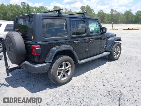 2021 Jeep Wrangler Unlimited Sahara with VIN 1C4HJXEN9MW681422, listed as a IAAI auction lot 42563426 with 48,582 mi miles and . Bid and sale history available at DreamBid. Image 4.