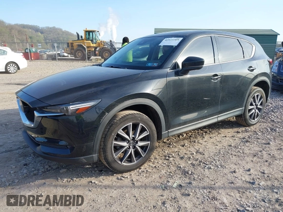 2018 Mazda CX-5 Grand Touring with VIN JM3KFBDM2J0463279, listed as a IAAI auction lot 42115309 with 68,851 mi miles. Bid and sale history available at carsss.com. Image 17.