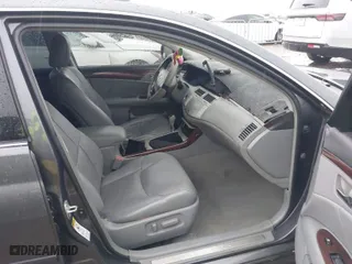2009 Toyota Avalon XL with VIN 4T1BK36B19U333046, listed as a IAAI auction lot 41895870 with 185,626 mi miles. Bid and sale history available at carsss.com. Image 5.