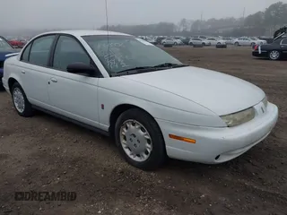 1997 Saturn SL z VIN 1G8ZK5272VZ270692, wystawiony jako IAAI lot #41926086 z przebiegiem 109 329 mil mil oraz . Historia ofert i sprzedaży dostępna na DreamBid. Obrazek 1.