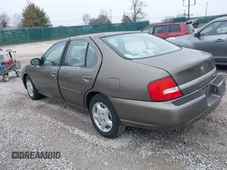 2001 Nissan Altima GXE with VIN 1N4DL01D81C187472, listed as a IAAI auction lot 41502436 with 195,203 mi miles. Bid and sale history available at carsss.com. Image 3.