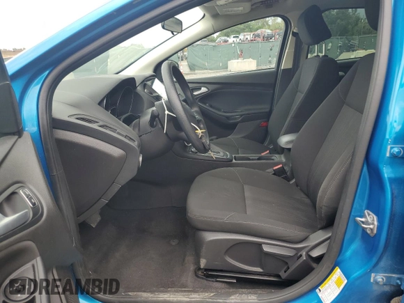 2016 Ford Focus SE z VIN 1FADP3F21GL386580, wystawiony jako Copart lot #63326425 z przebiegiem 82 139 mil mil oraz Szkoda całkowita • Salvage title. Historia ofert i sprzedaży dostępna na DreamBid. Obrazek 7.
